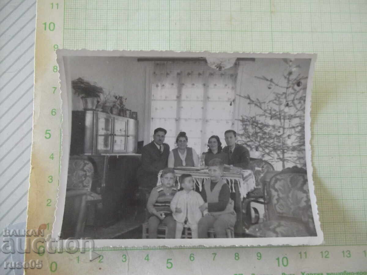 Vintage photo of people celebrating Christmas