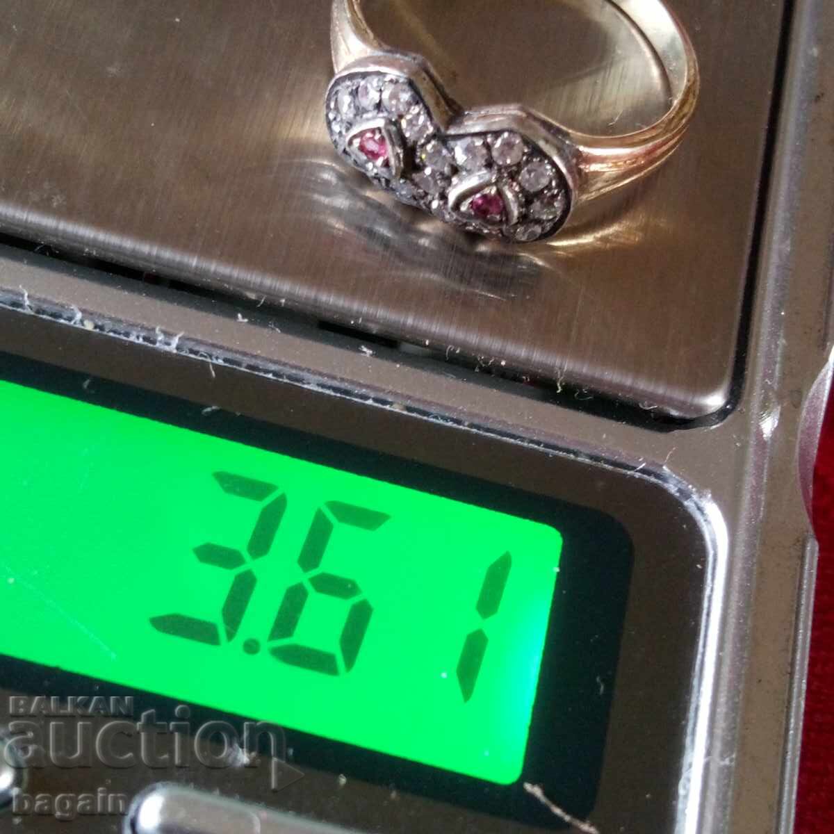 Auction  Designer silver ring with rubies, zircons, and gold plating