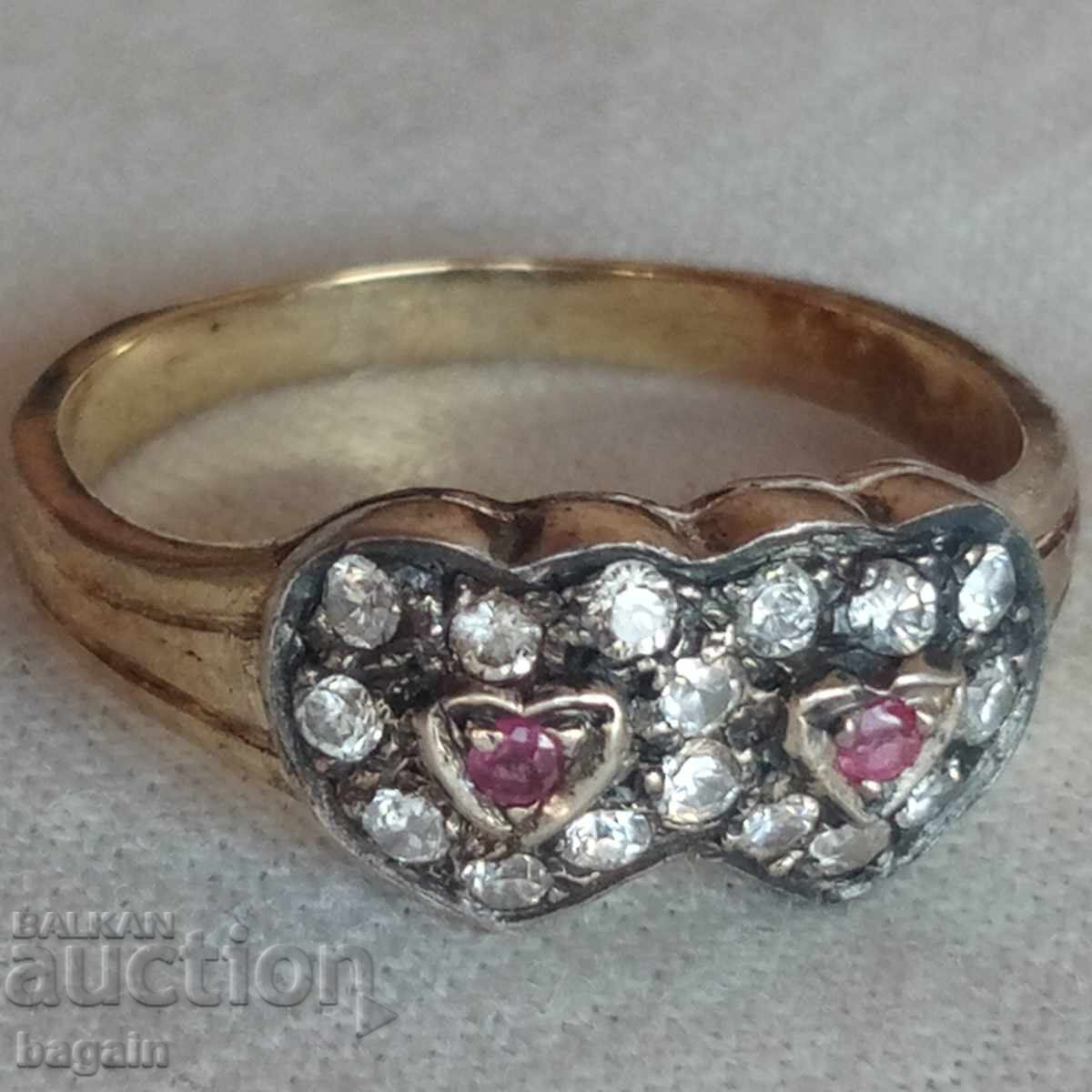 Designer silver ring with rubies, zircons, and gold plating