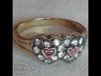 Designer silver ring with rubies, zircons, and gold plating