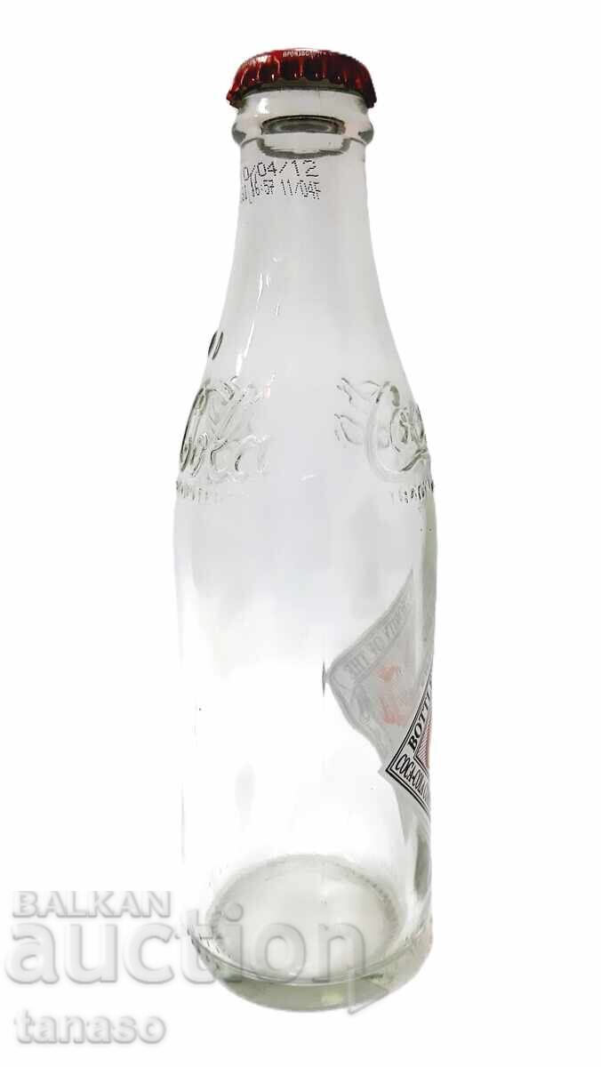 Стъклена бутилка Coca-Cola 2012 лимитирана серия като нова с цена € 11.00 | 21.51 лв. Стъклена бутилка Coca-Cola 2012 лимитирана серия като нова с цена € 11.00 | 21.51 лв.
