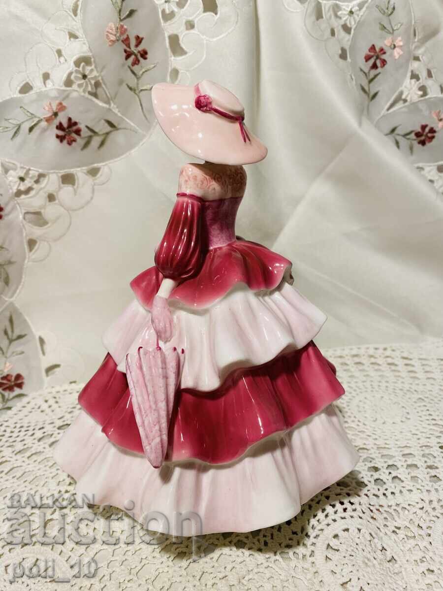 Auction porcelain figurine Auction porcelain figurine