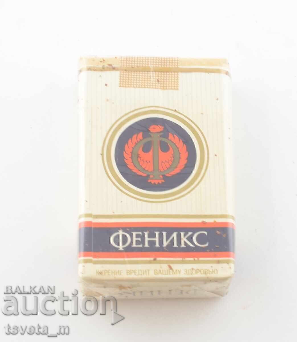 PHOENIX cigarettes, sealed with cellophane and a social banderole