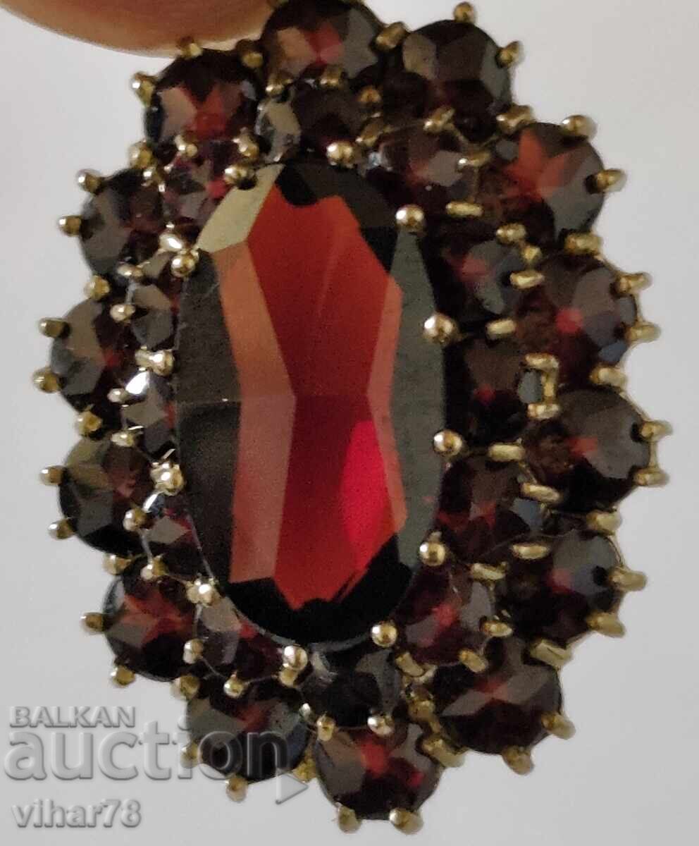 Delivery of Gold pendant -8 karat- 333 with garnets