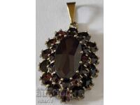 Gold pendant -8 karat- 333 with garnets