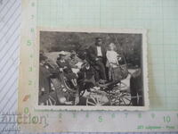 Old photo of a German soldier with women and a child in a horse-drawn carriage