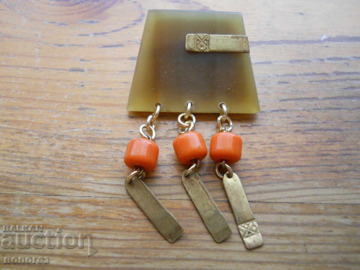 Antique brooch with red coral pendants