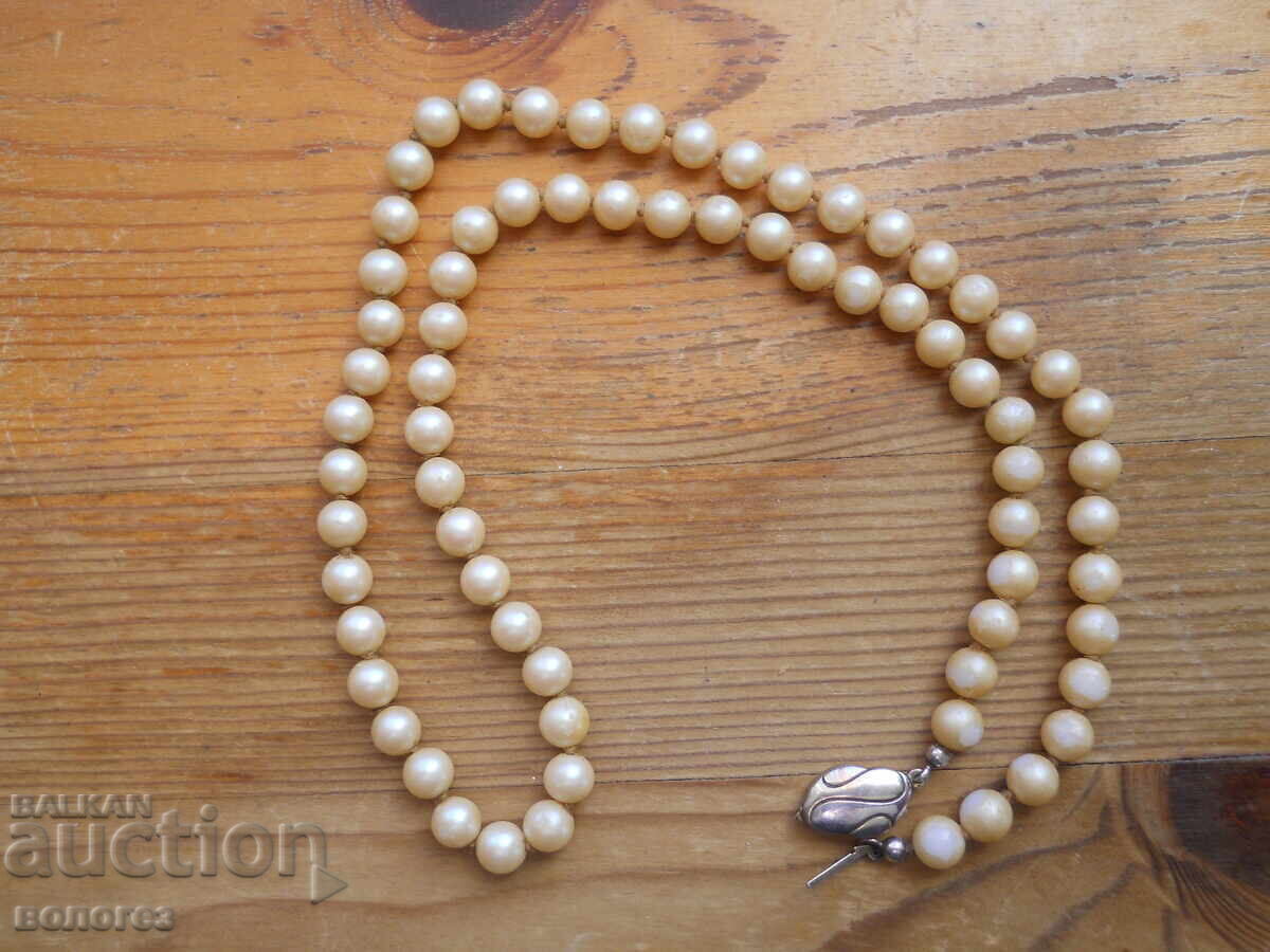 Pearl necklace with a silver clasp