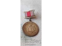 Нагръден знак НРБ За отличен успех и примерно поведение