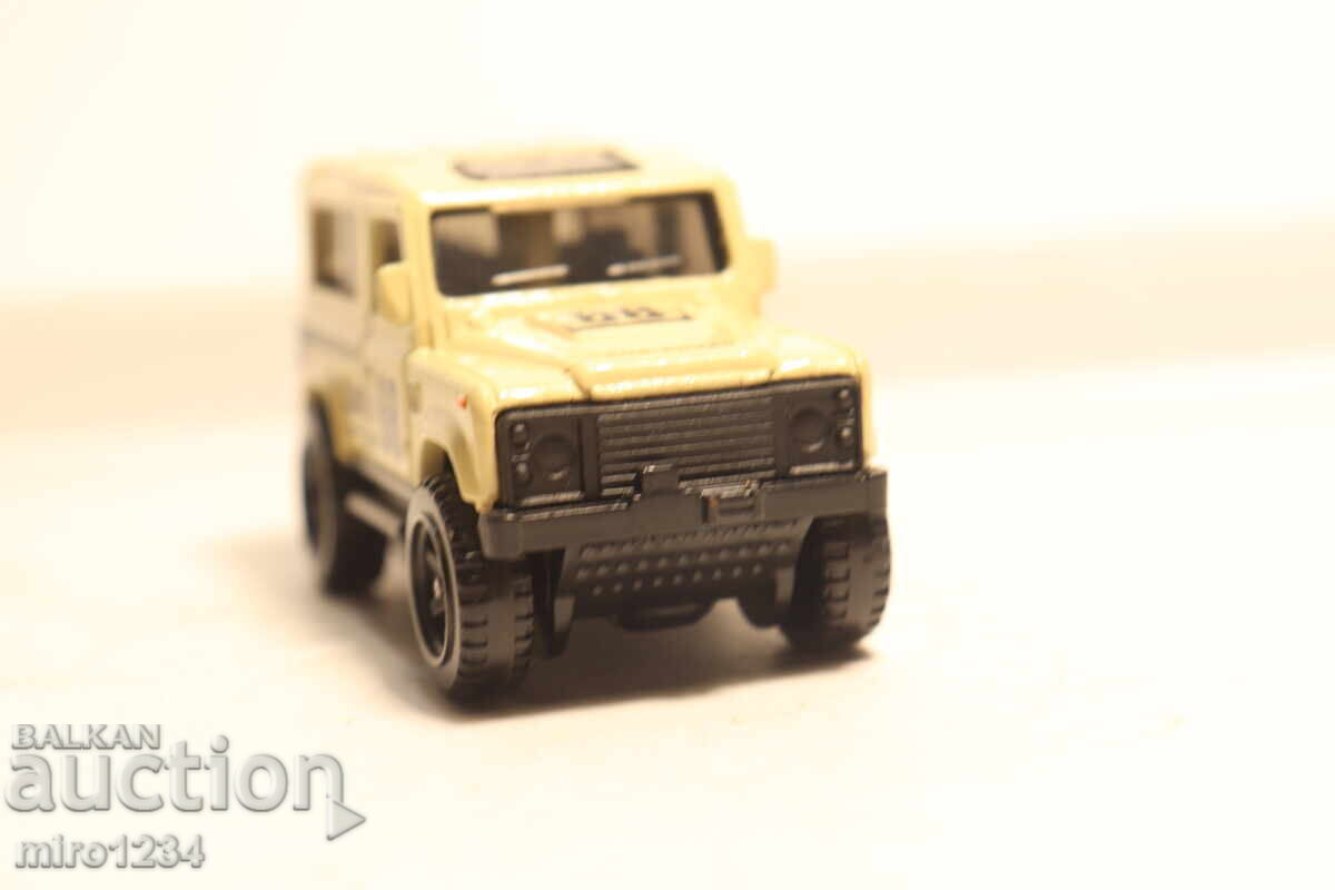Licitație MAȘINUȚĂ MODEL HOT WHEELS LAND ROVER 1/64
