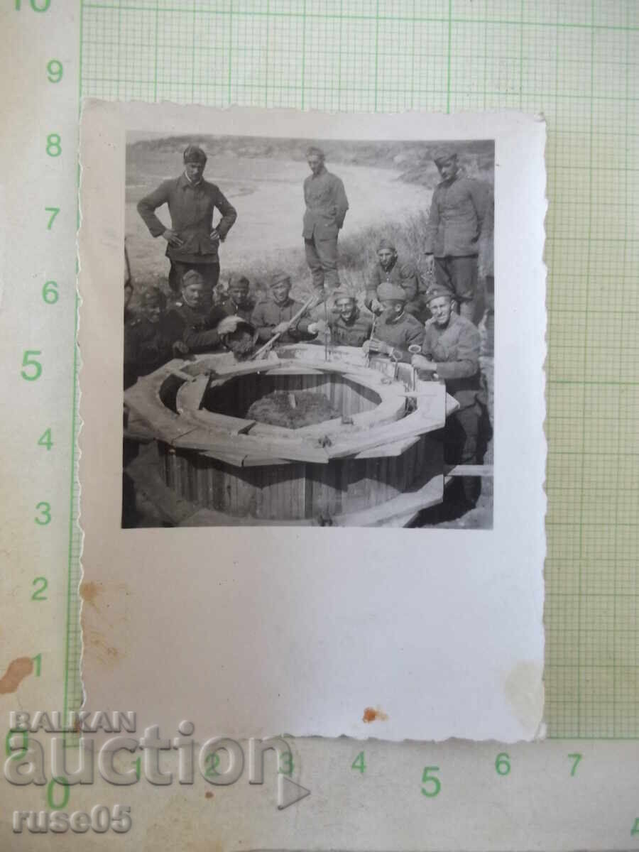 Old photo of soldiers around formwork