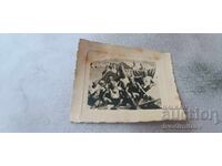 Photo Soldiers naked to the waist in front of tents