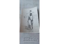 Photo Kiten Man boy and little girl on the seashore 1975