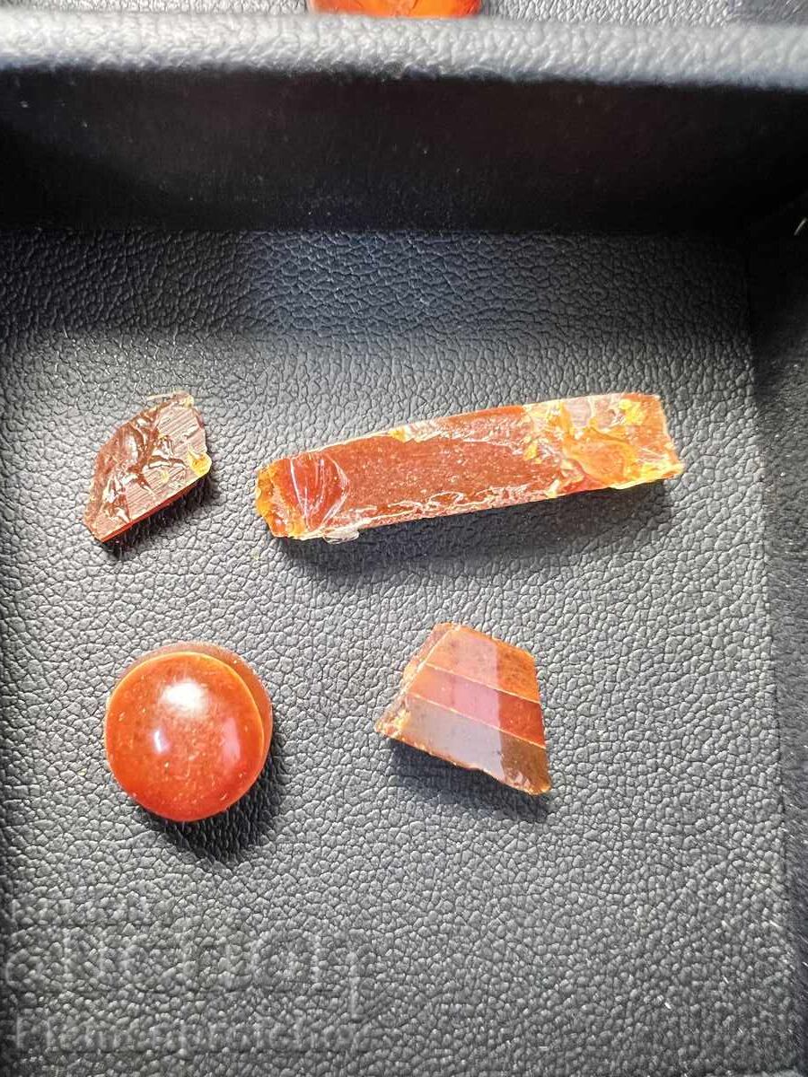Delivery of 31 GRAMS YELLOW AND RED AMBER Delivery of 31 GRAMS YELLOW AND RED AMBER