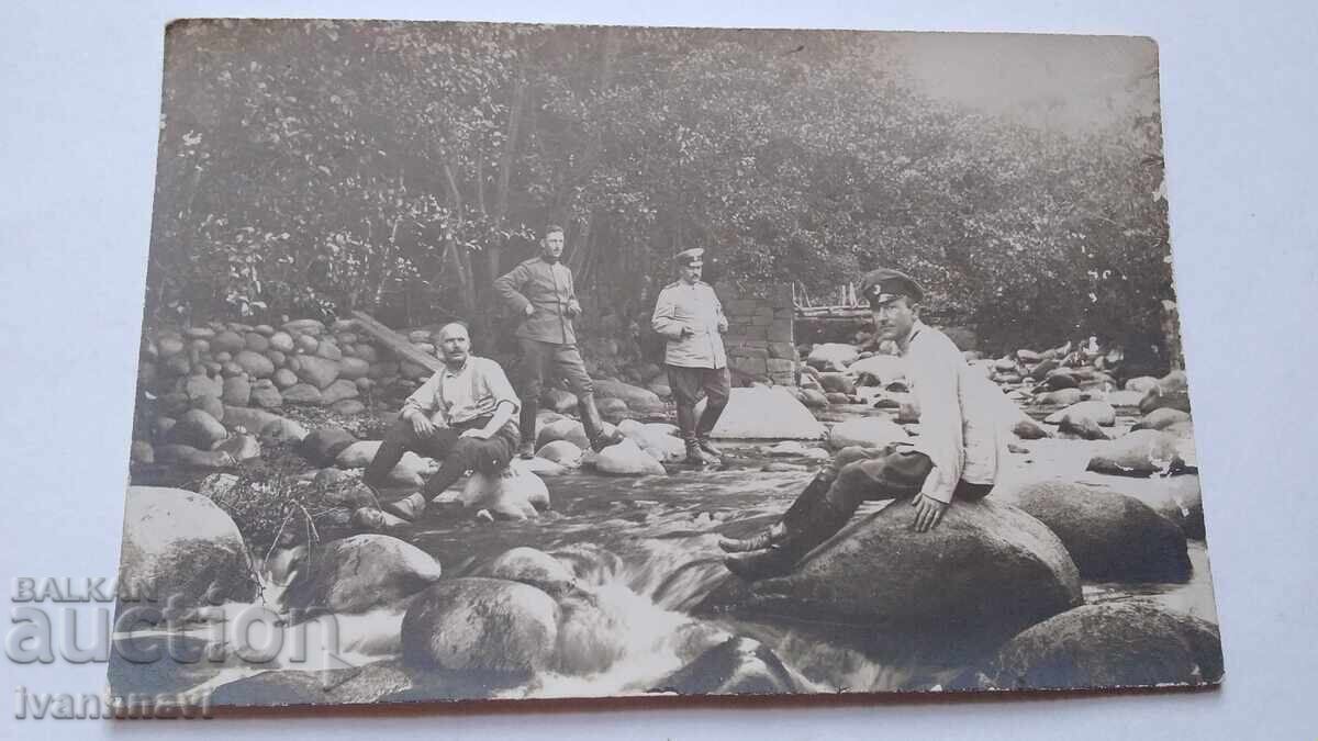 Old photo of soldiers by the river