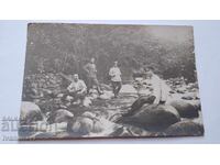 Old photo of soldiers by the river