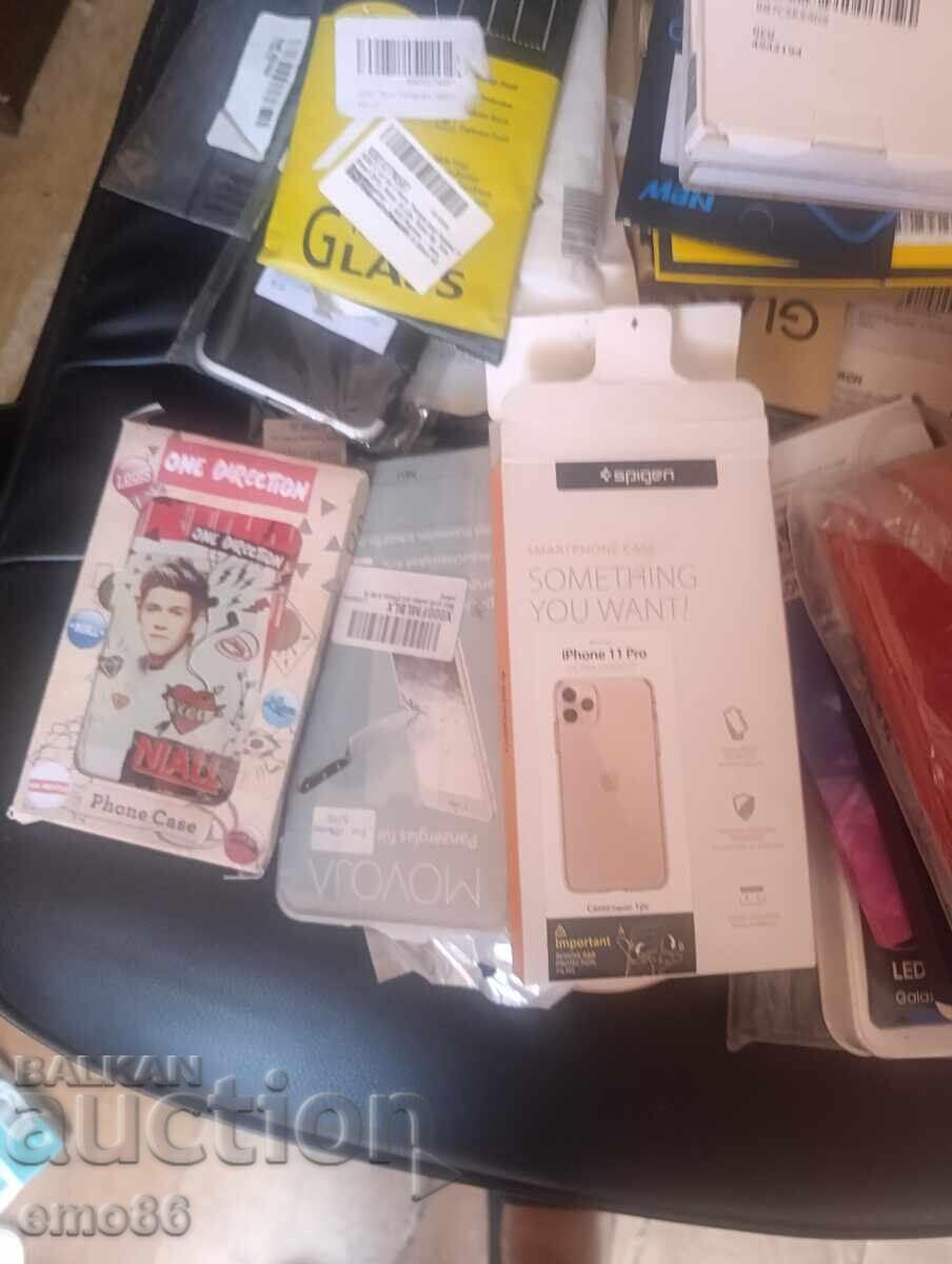 Auction Lot of 31 phone screen protectors and cases Auction Lot of 31 phone screen protectors and cases