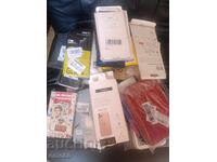 Lot of 31 phone screen protectors and cases