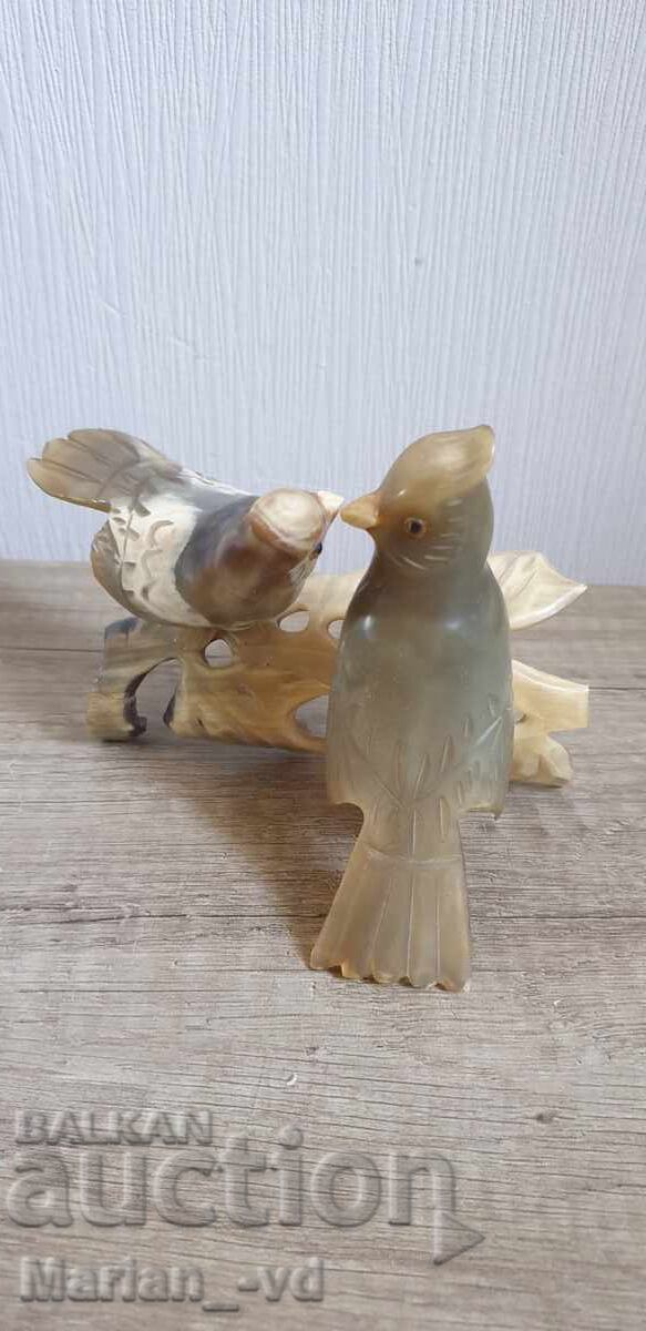 Delivery of Two birds made of bone