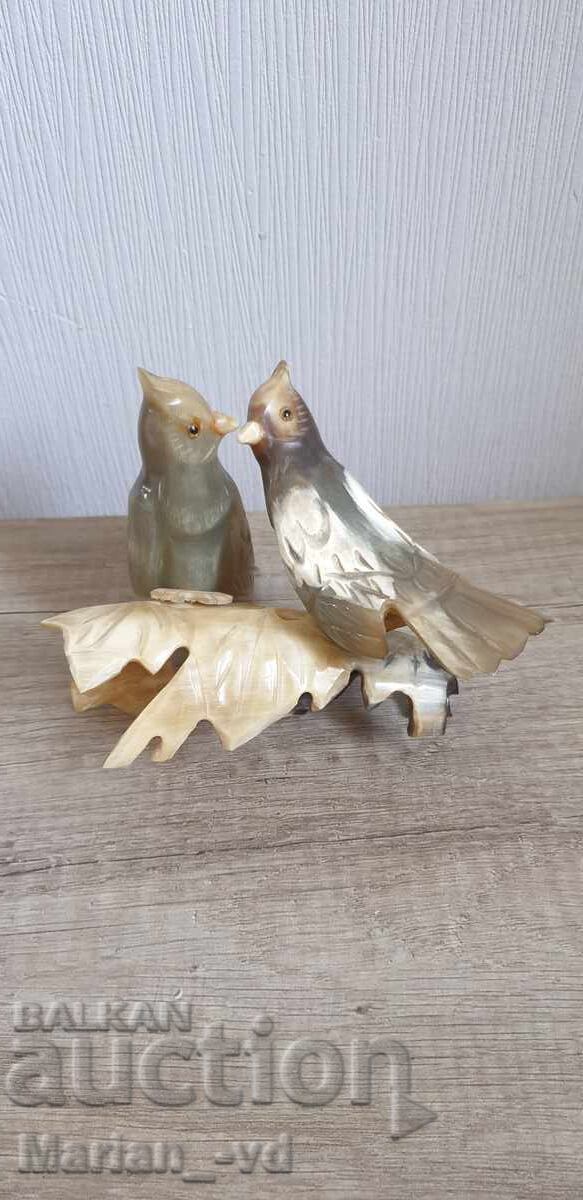 Two birds made of bone