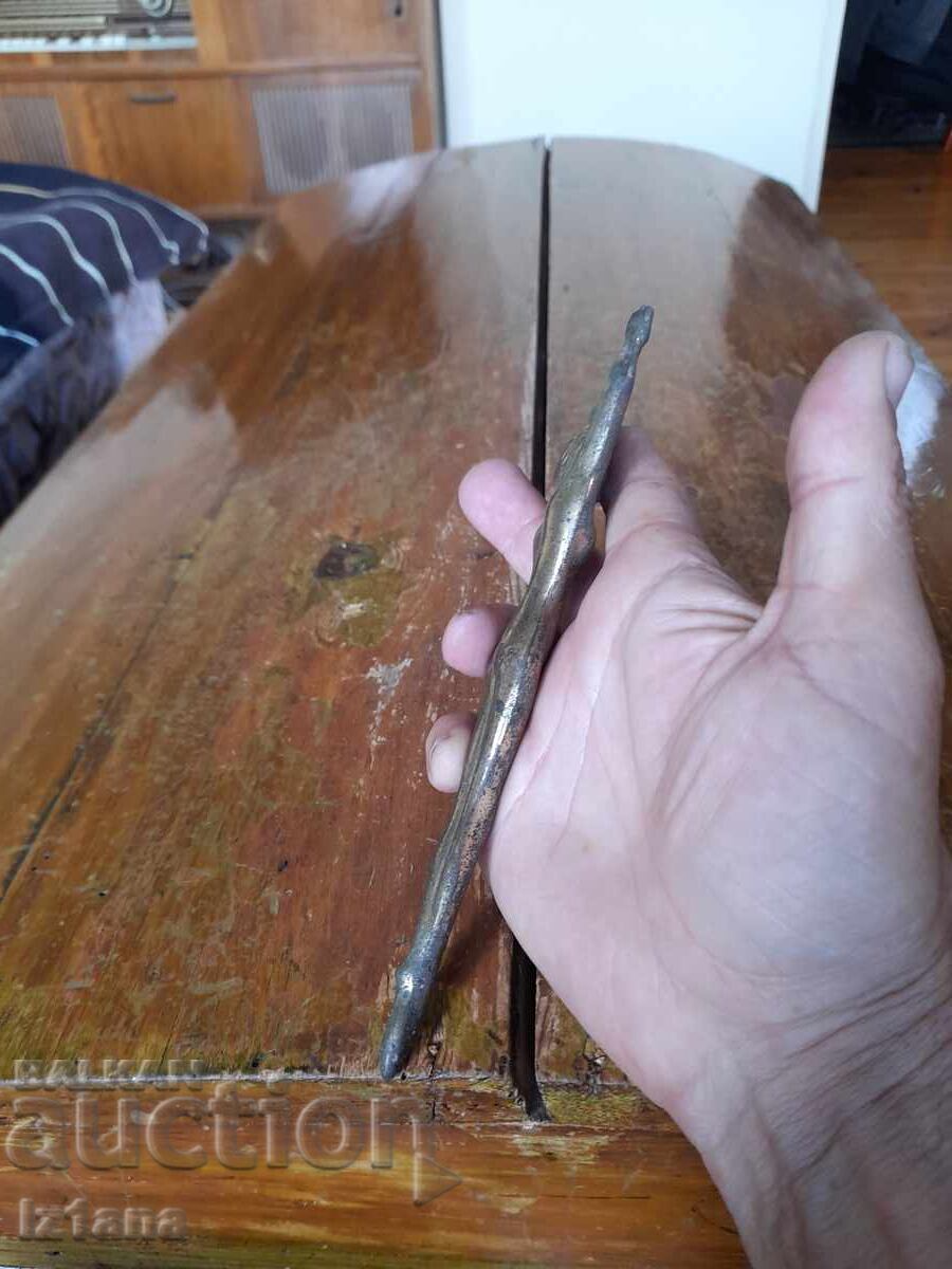 Livrarea Un vechi deschizător de sticle Livrarea Un vechi deschizător de sticle