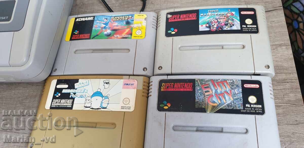 Licitație Consolă Super Nintendo cu patru dischete