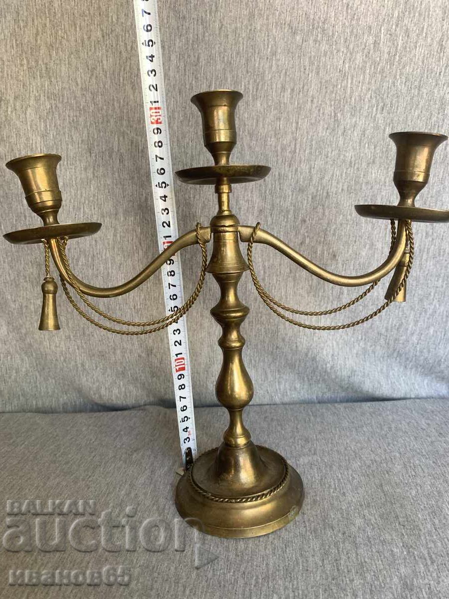 Brass candlestick with decorative ropes and tassels with price € 45.00 | 88.01 BGN Brass candlestick with decorative ropes and tassels with price € 45.00 | 88.01 BGN