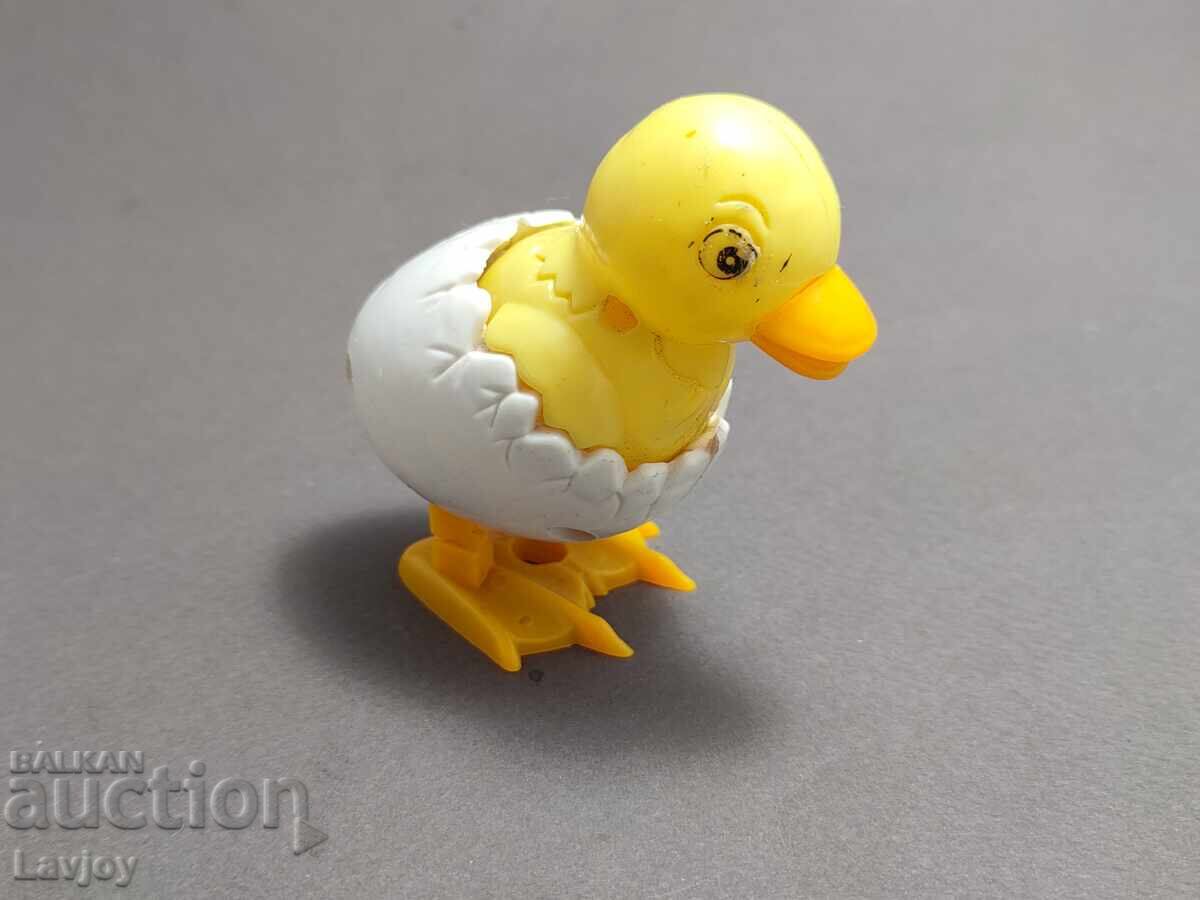 Доставка на Механична играчка пиле