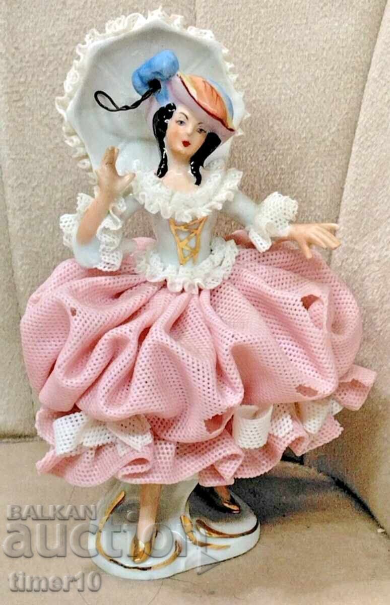 German porcelain lace figurine woman with umbrella Dresden with price € 50.00 | 97.79 BGN