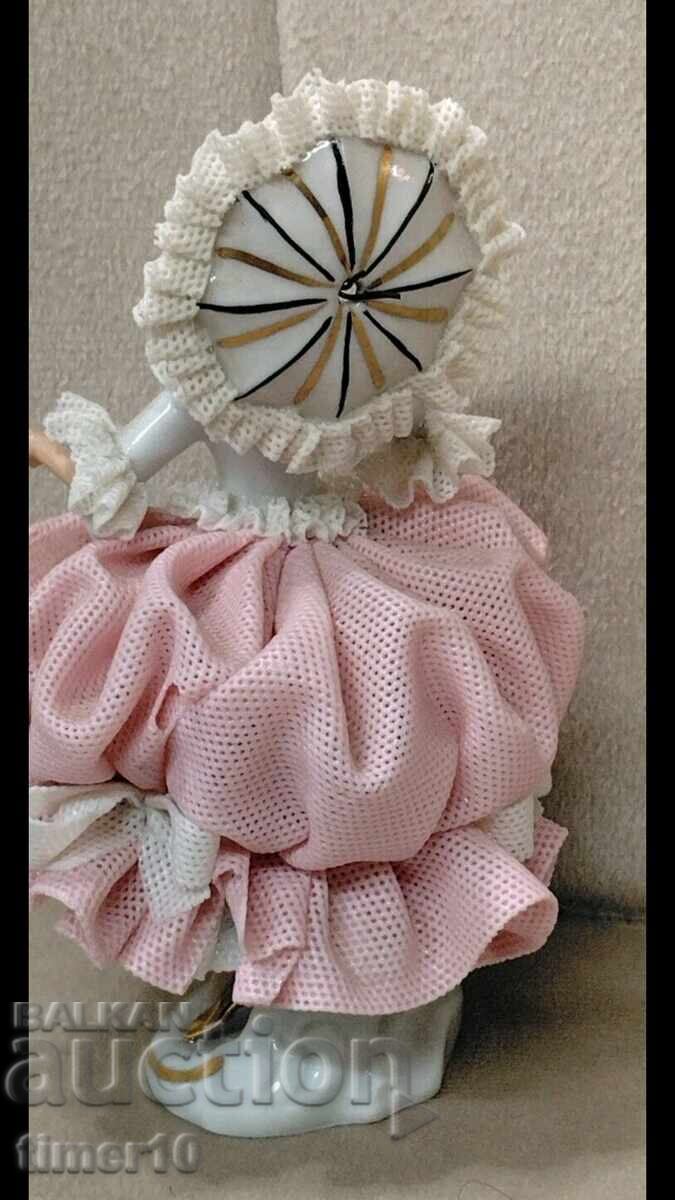 Delivery of German porcelain lace figurine woman with umbrella Dresden