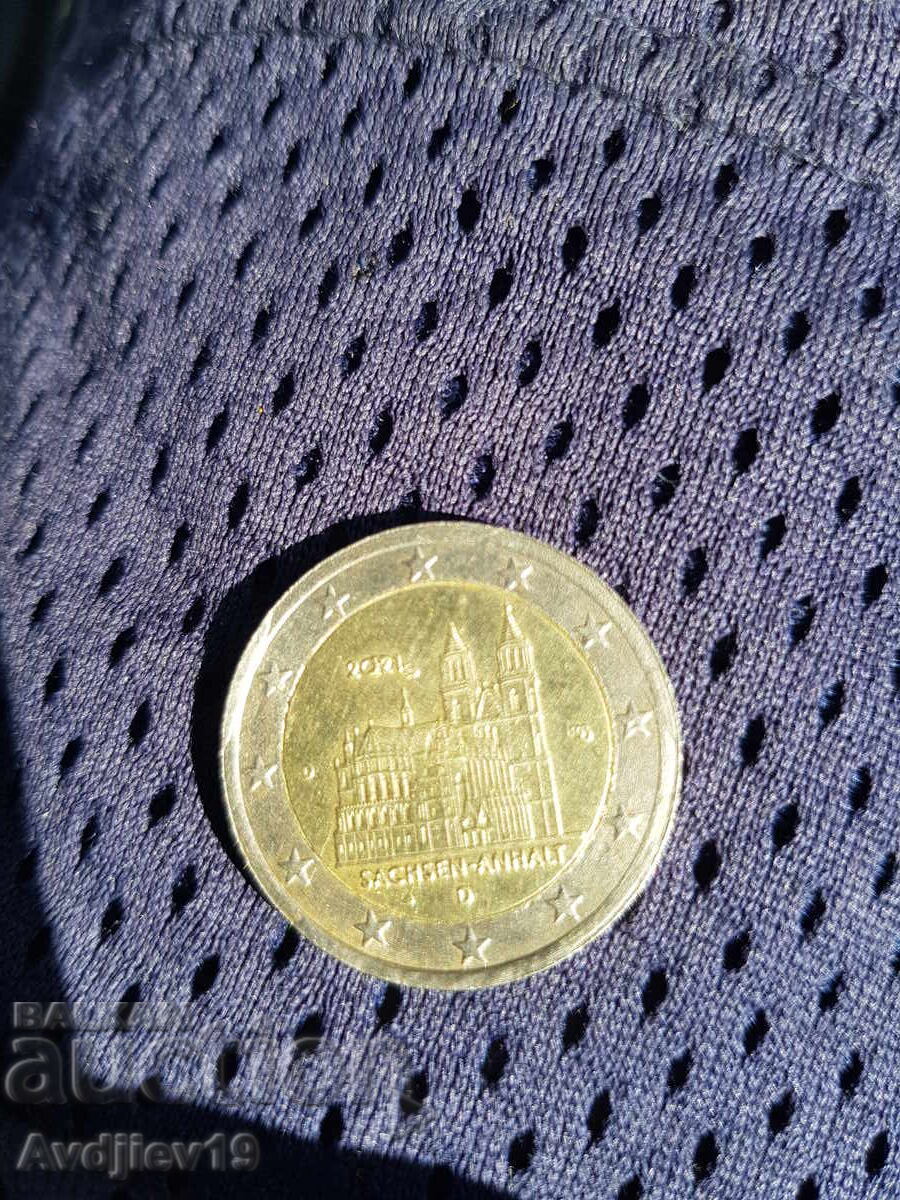 Monedă de 2 euro cu defecte de fabricație