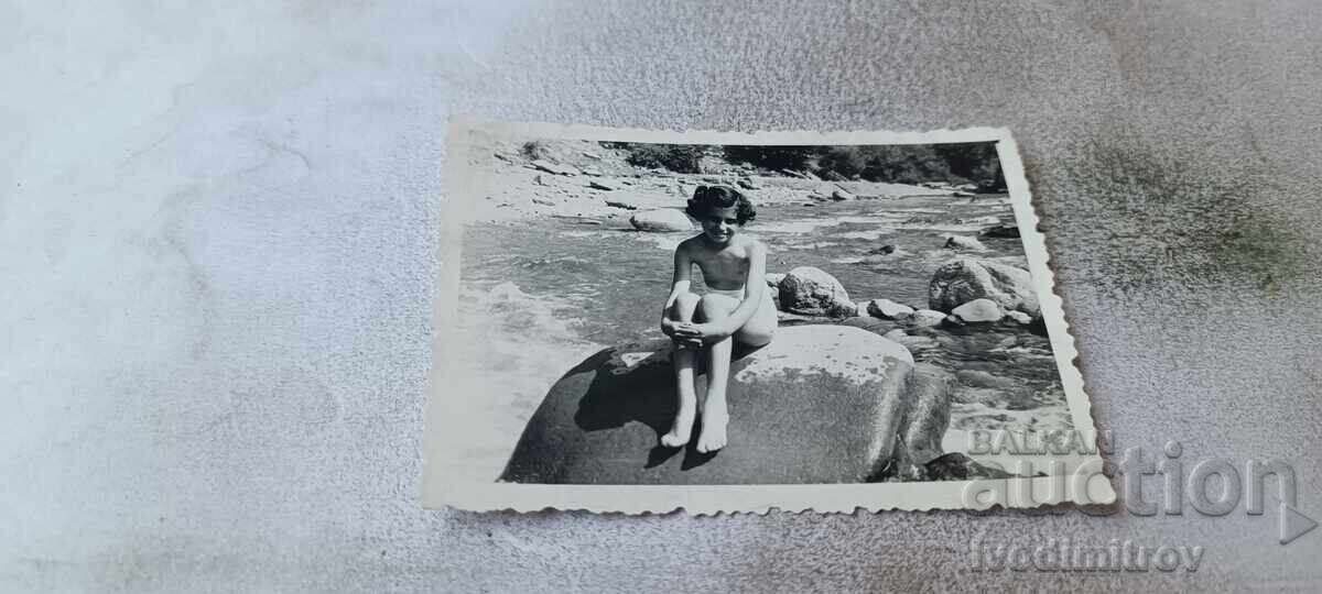 S-ka Sofia Young girl sitting on a rock by the river 1955