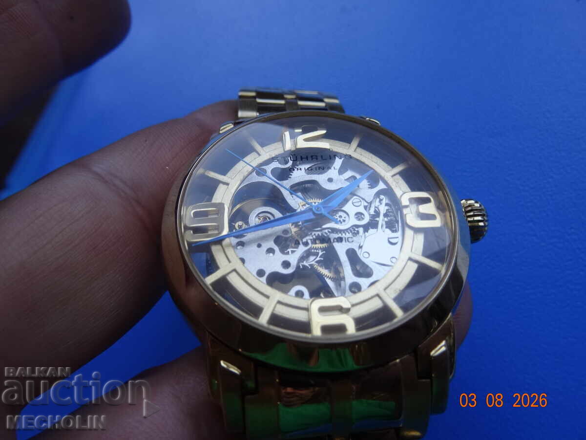 Auction  COLLECTIBLE STUHRLING AUTOMATIC SKELETON WATCH