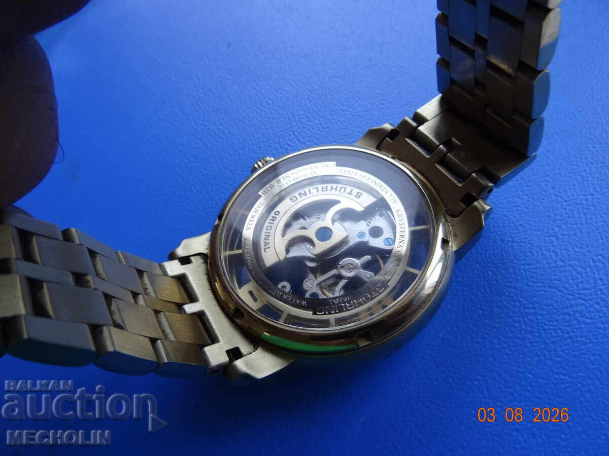 Delivery of COLLECTIBLE STUHRLING AUTOMATIC SKELETON WATCH