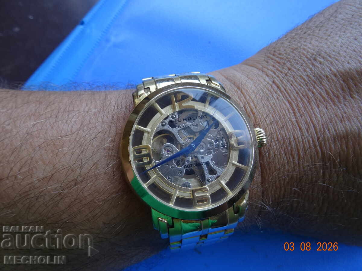 COLLECTIBLE STUHRLING AUTOMATIC SKELETON WATCH