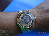 COLLECTIBLE STUHRLING AUTOMATIC SKELETON WATCH