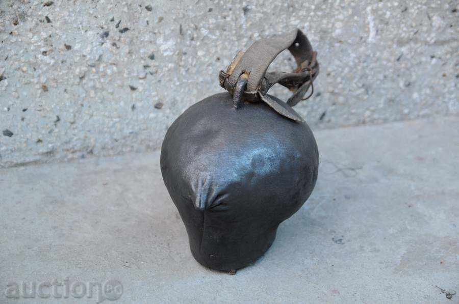 Auction  Iron thong / bell with a strap