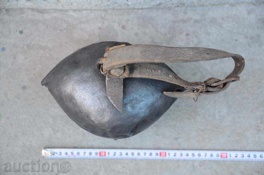 Delivery of Iron thong / bell with a strap