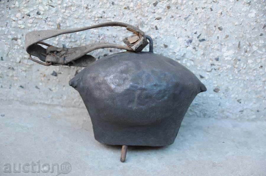 Iron thong / bell with a strap