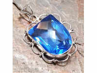 Silver medallion, sapphire crystal glass, blue stone