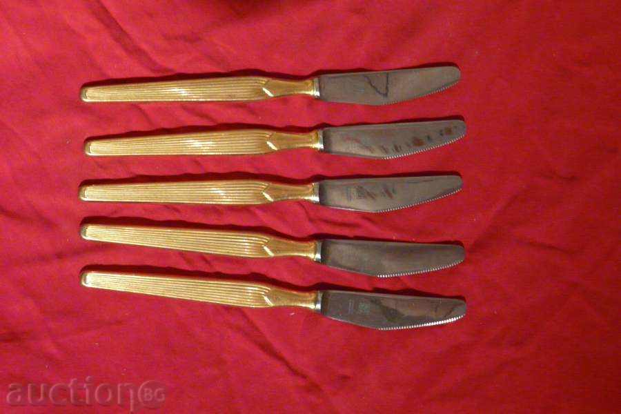 gilded knives
