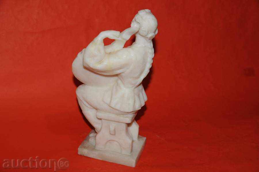 Delivery of A figurine of a girl playing a string instrument Delivery of A figurine of a girl playing a string instrument