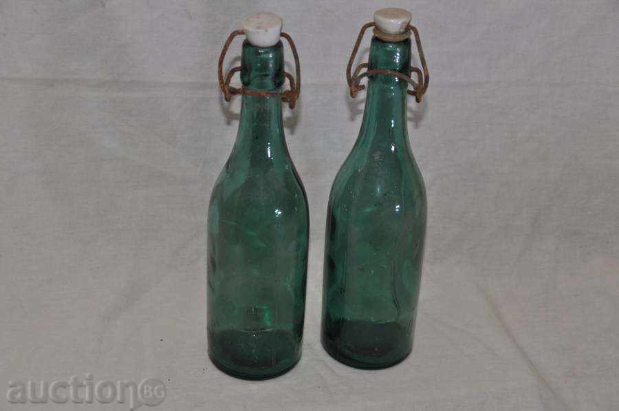 green beer bottles, two pieces