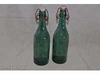 green beer bottles, two pieces