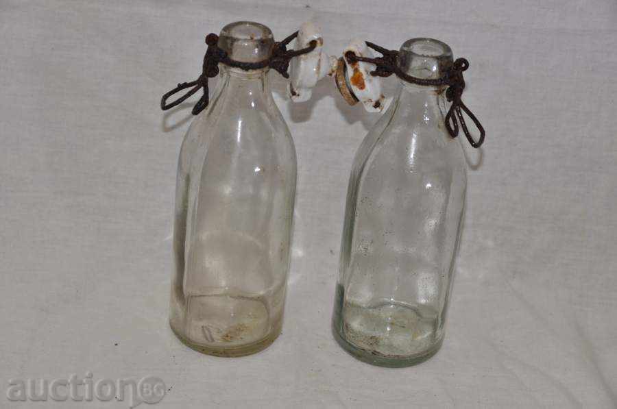two sets of carbonated water bottles