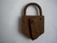 An old forged padlock.