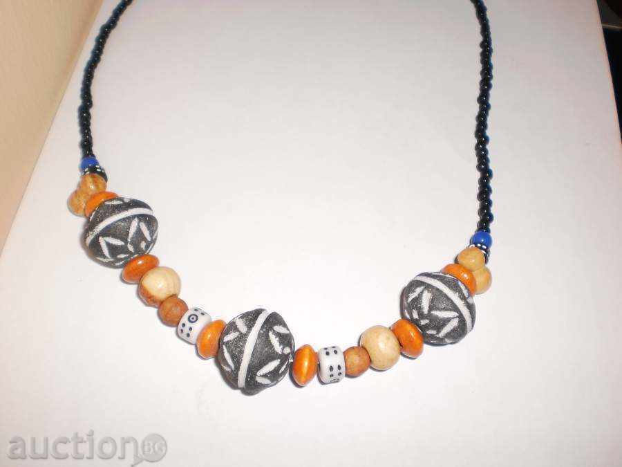 Necklace with African motifs in grunge style-1