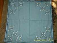 old hand embroidered tablecloth