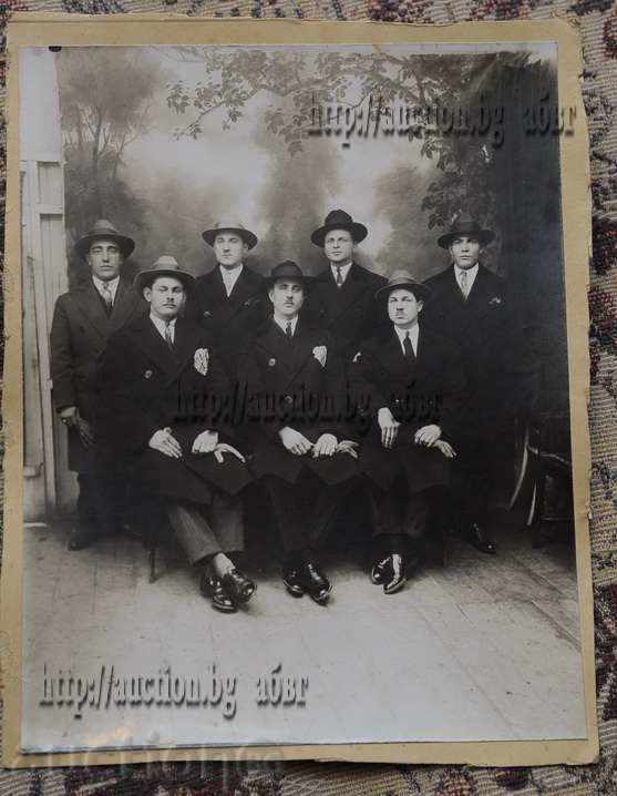 Seven men in costumes 1930s
