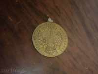 monedă de aur din alamă antic